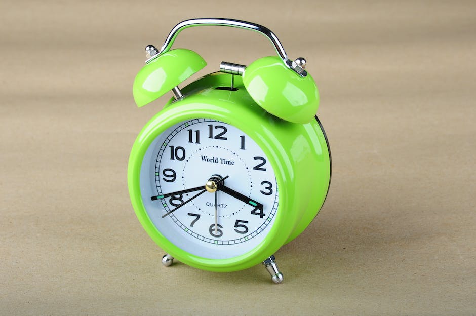 Close-up of a green alarm clock
